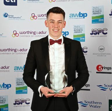 Managing Director, Henry King, with his 2018 Business award